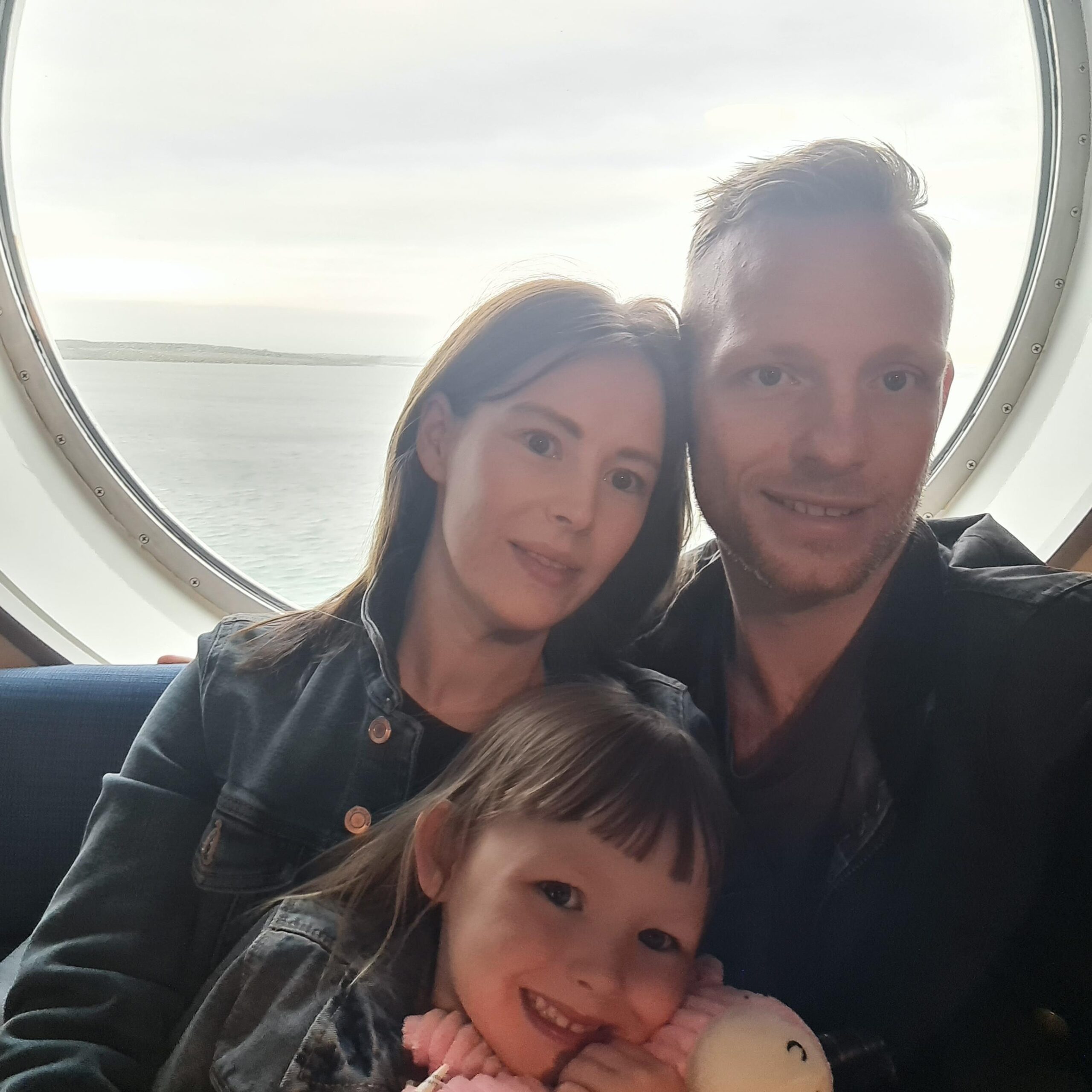 Image of family of three